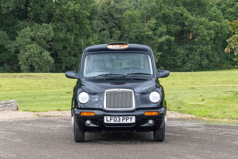 LONDON TAXIS INTERNATIONAL TXII London Taxis International TX2 Gold Taxicab 2003